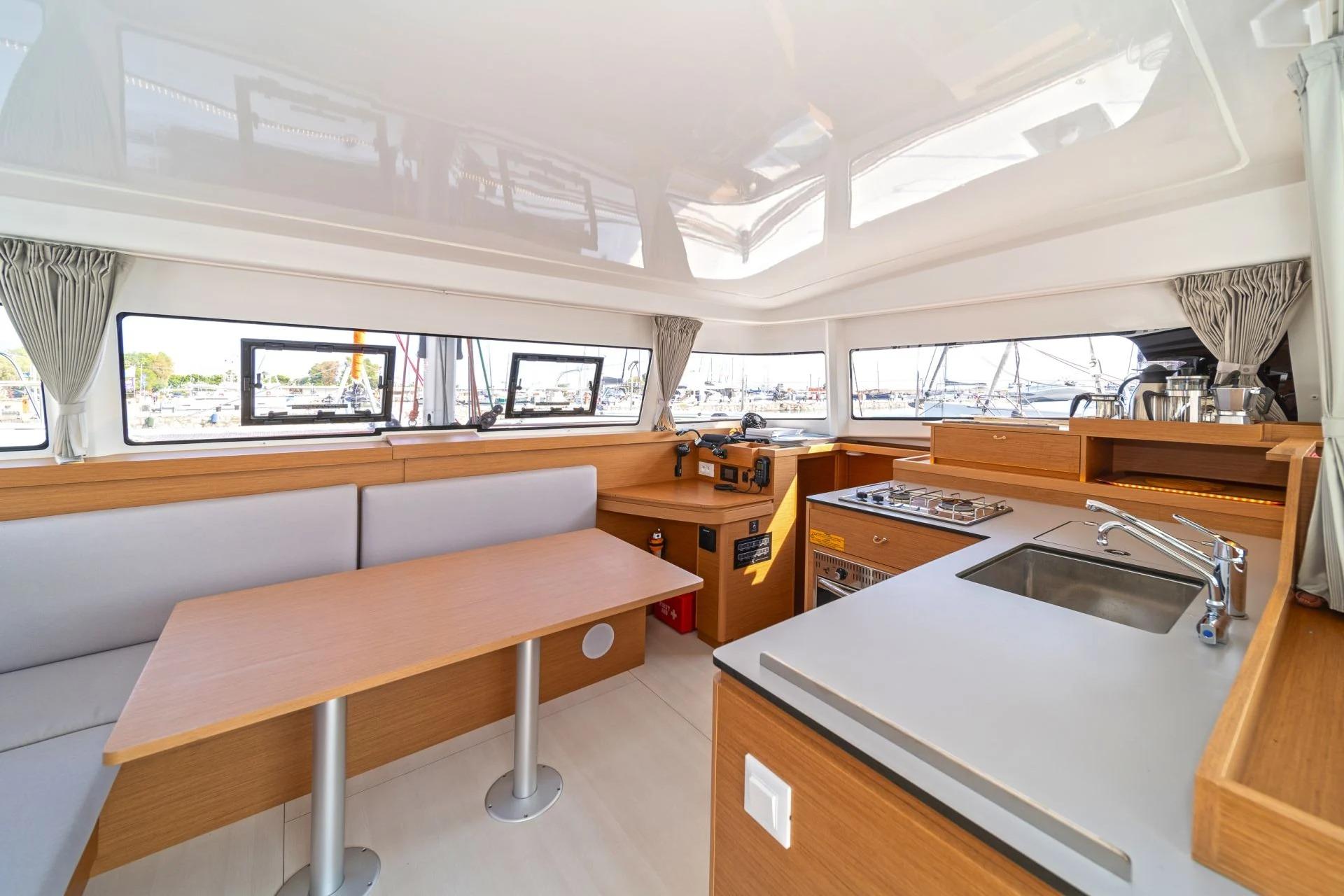 Main saloon and galley overlooking the marina